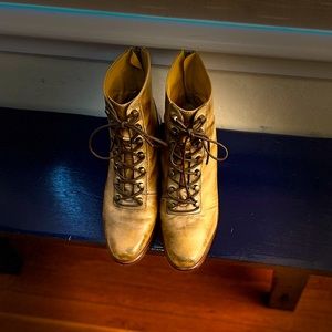 Size 9(40 in EU) FREE PEOPLE boots—Brown and laced with logo.